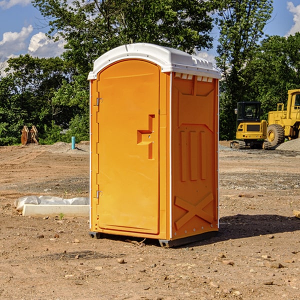 what is the cost difference between standard and deluxe portable restroom rentals in Rushford